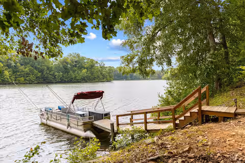 Pontoon on the lake at a Bello Homes managed property