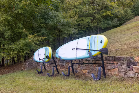 Paddleboards by the water